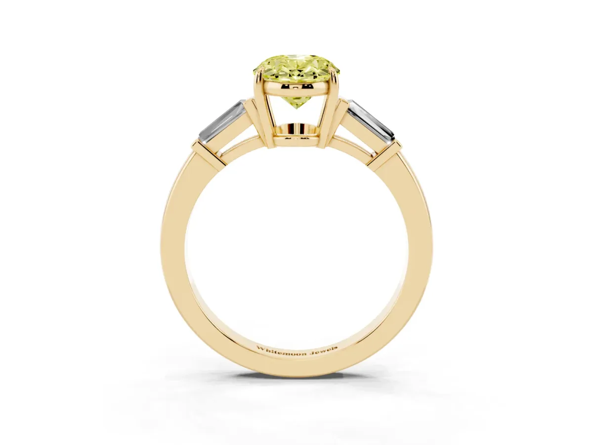 Fancy Yellow Oval Cut Diamond Three-Stone Ring with Tapered Baguette Side Stones and Prong Setting Yellow gold