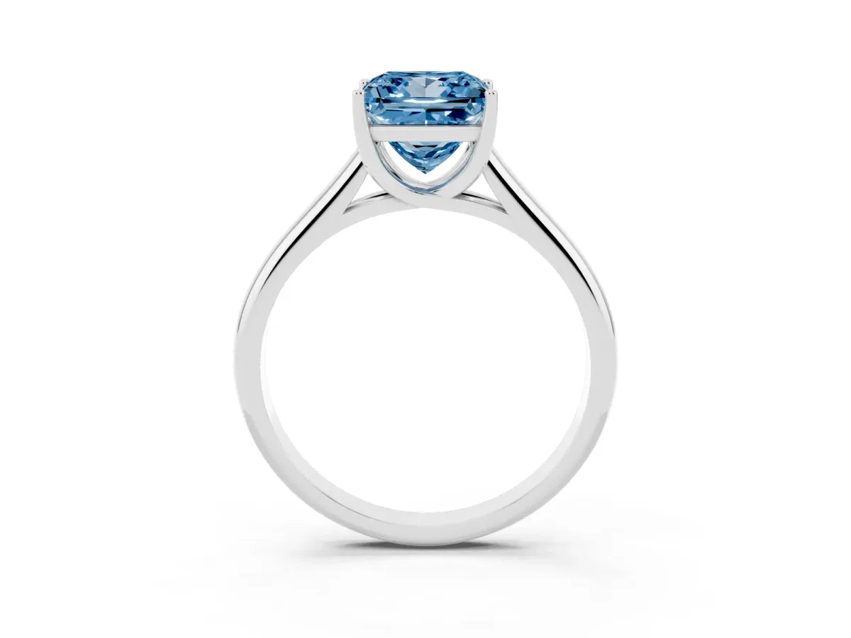 Fancy Blue Princess Cut Solitaire Engagement Ring with Tapered Band and Four-Prong Setting Silver