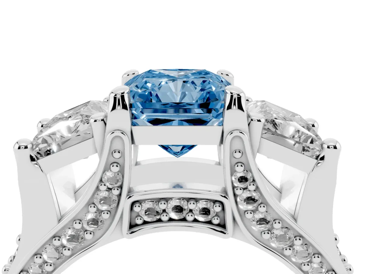 Fancy Blue Radiant Cut Diamond Three-Stone Ring with Channel Set Band and Four-Prong Setting Silver