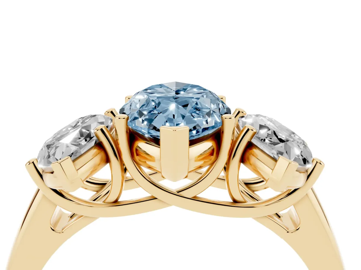 Fancy Blue Three-Stone Marquise Cut Diamond Engagement Ring with Prong Setting Yellow gold