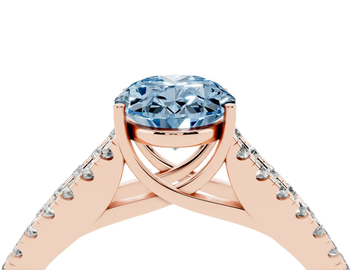 Fancy Blue Oval Cut Diamond Split Shank Engagement Ring with Round Pavé and Prong Setting Rose gold