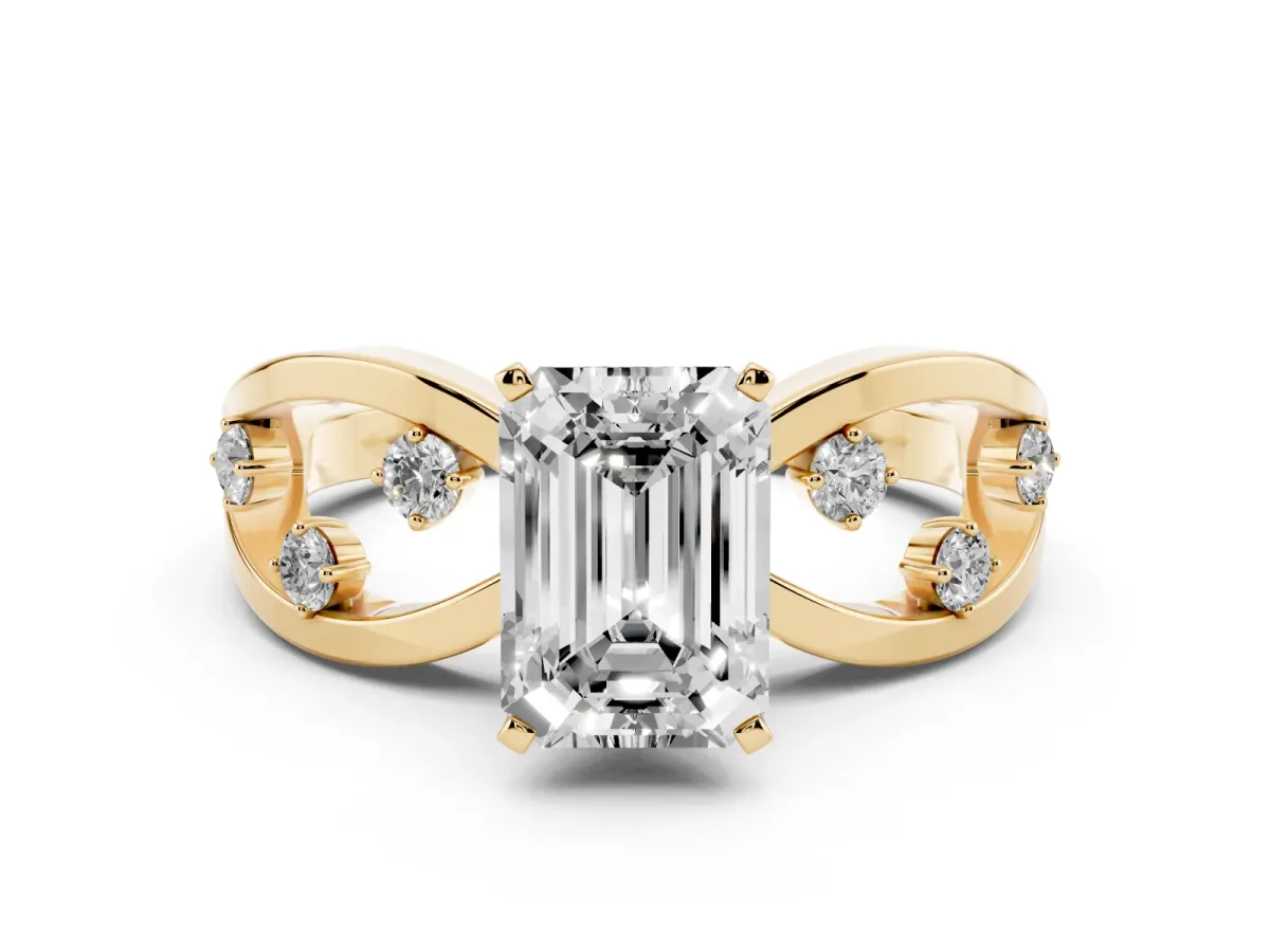Emerald Cut Cut Solitaire Diamond with Side Stones on Criss-Cross Band and Four-Prong Setting Yellow gold