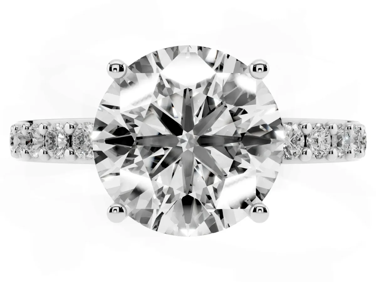 Round Cut Cut Diamond Solitaire with Pave Band and Four-Prong Setting Silver