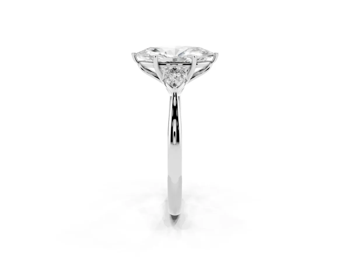 Three-Stone Marquise Cut Diamond Ring with Pear Side Stones in Four-Prong Setting Platinum