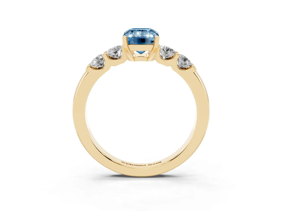Fancy Blue Emerald Cut Brilliant Cut Diamond Five-Stone Prong Set Engagement Ring with Channel Band Yellow gold