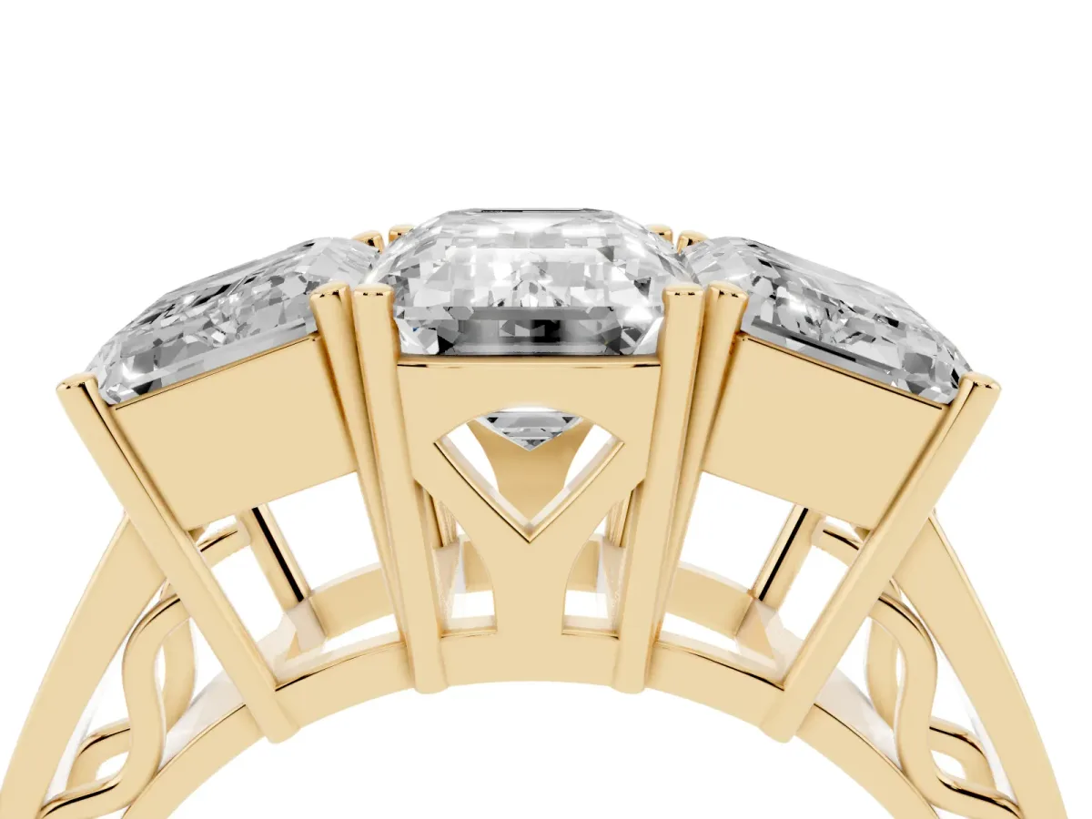 Emerald Cut Diamond Three-Stone Ring with Prong Setting and Textured Band Yellow gold