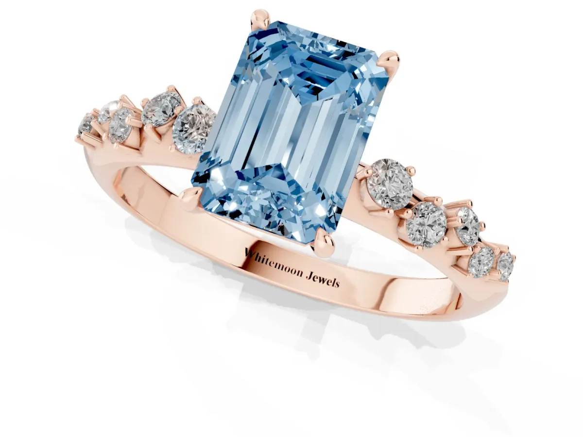 Fancy Blue Emerald Cut Diamond Cluster Side Stone Solitaire Ring with Prong Setting Rose gold