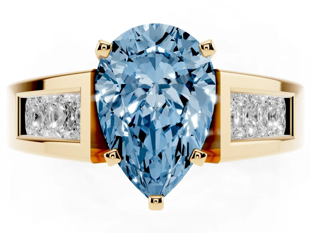 Fancy Blue Pear Cut Cut Channel Set Solitaire Ring with Four-Prong Setting Yellow gold
