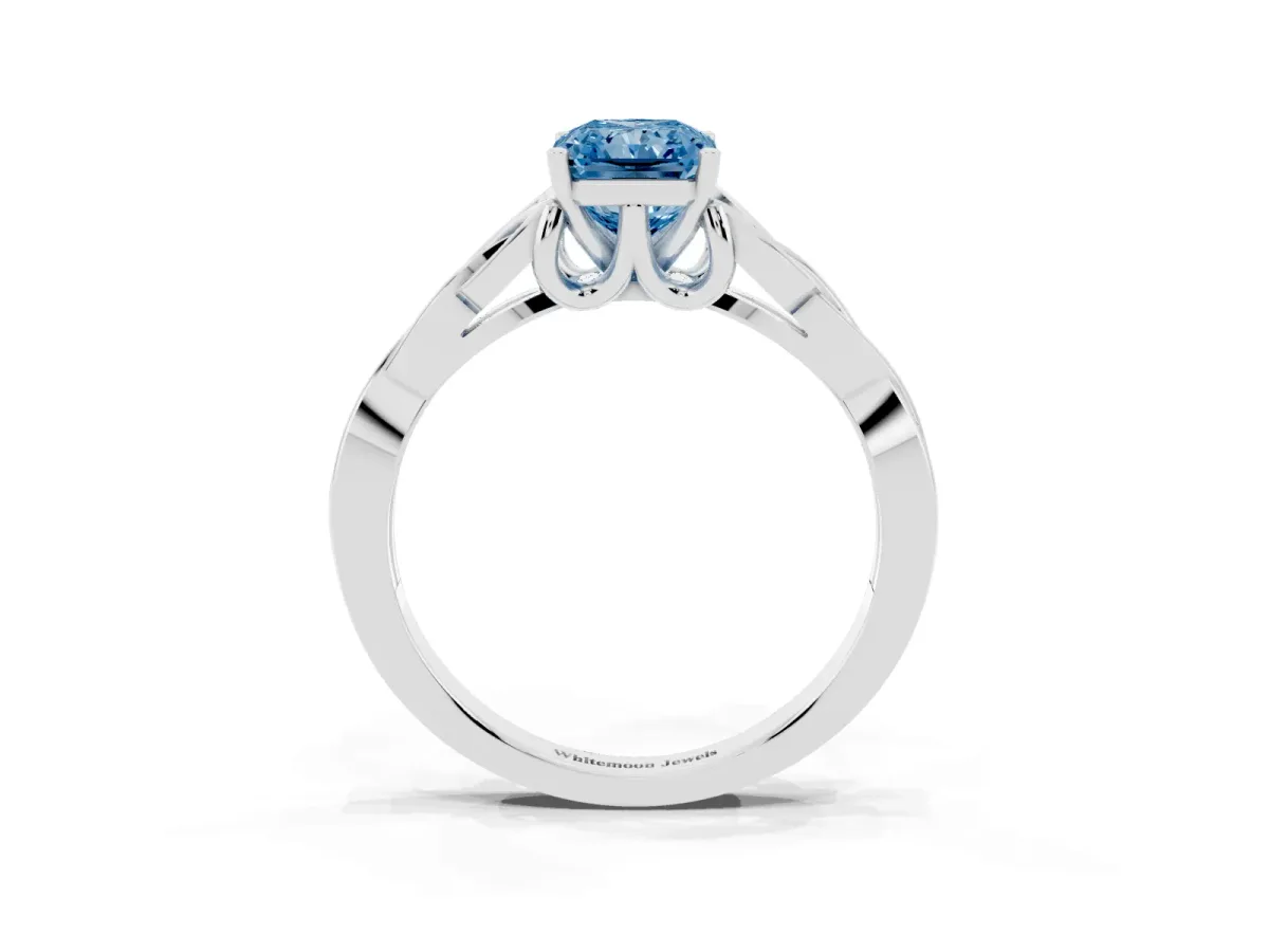 Fancy Blue Radiant Cut Diamond Solitaire Engagement Ring with Celtic Knot Band and Four-Prong Setting White gold