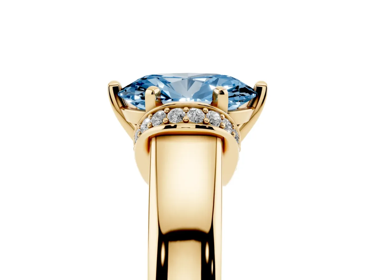 Fancy Blue Oval Cut Solitaire Diamond Ring with Pave Band and Six-Prong Setting Yellow gold