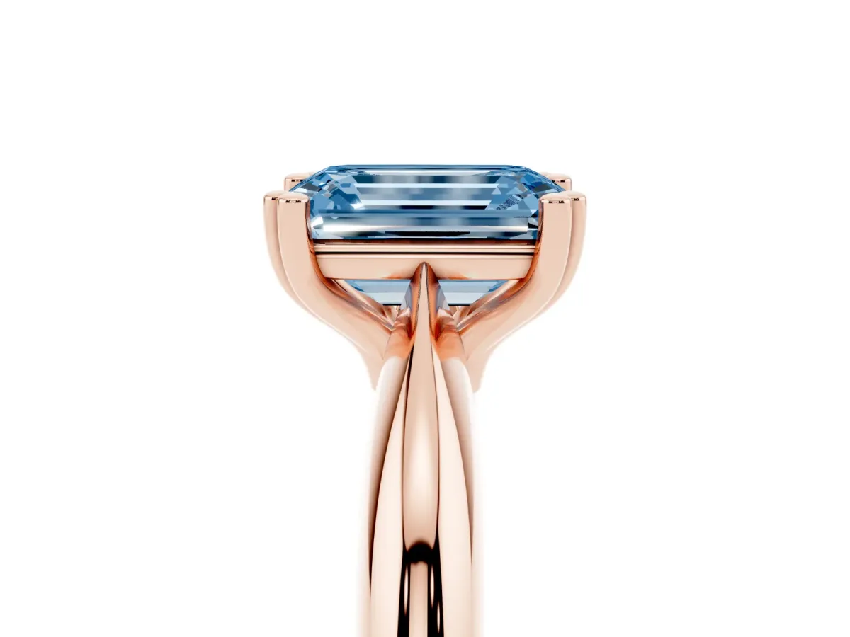 Fancy Blue Emerald Cut Cut Solitaire Engagement Ring with Tapered Band and Four-Prong Setting Rose gold