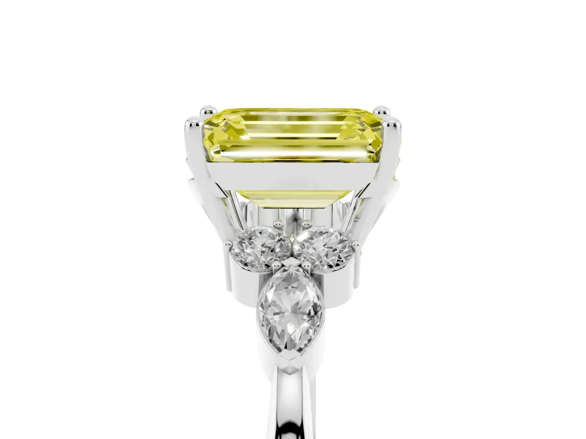 Fancy Yellow Emerald Cut Brilliant Diamond Solitaire Ring with Pear Side Stones and Four-Prong Setting White gold