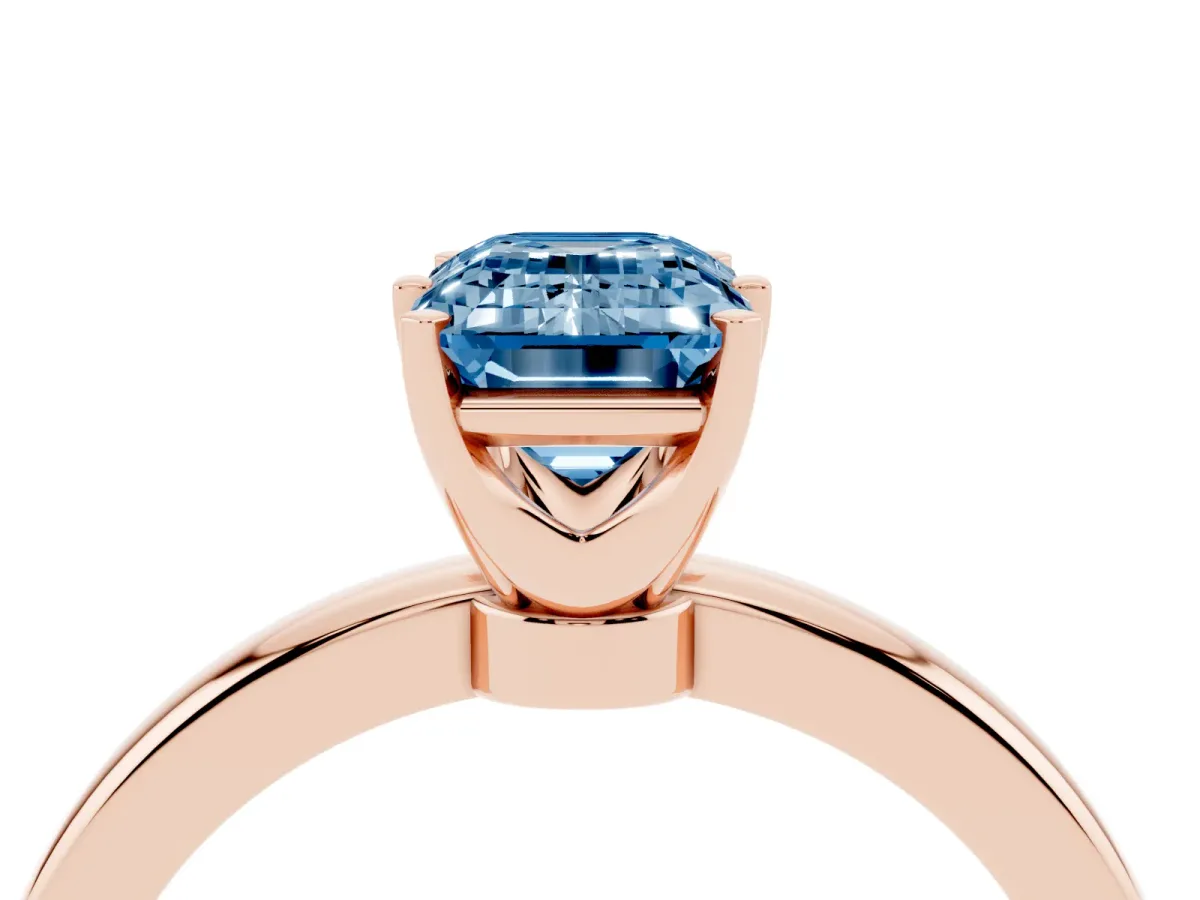 Fancy Blue Emerald Cut Solitaire Diamond Ring with Six-Prong Setting on a Classic Band Rose gold