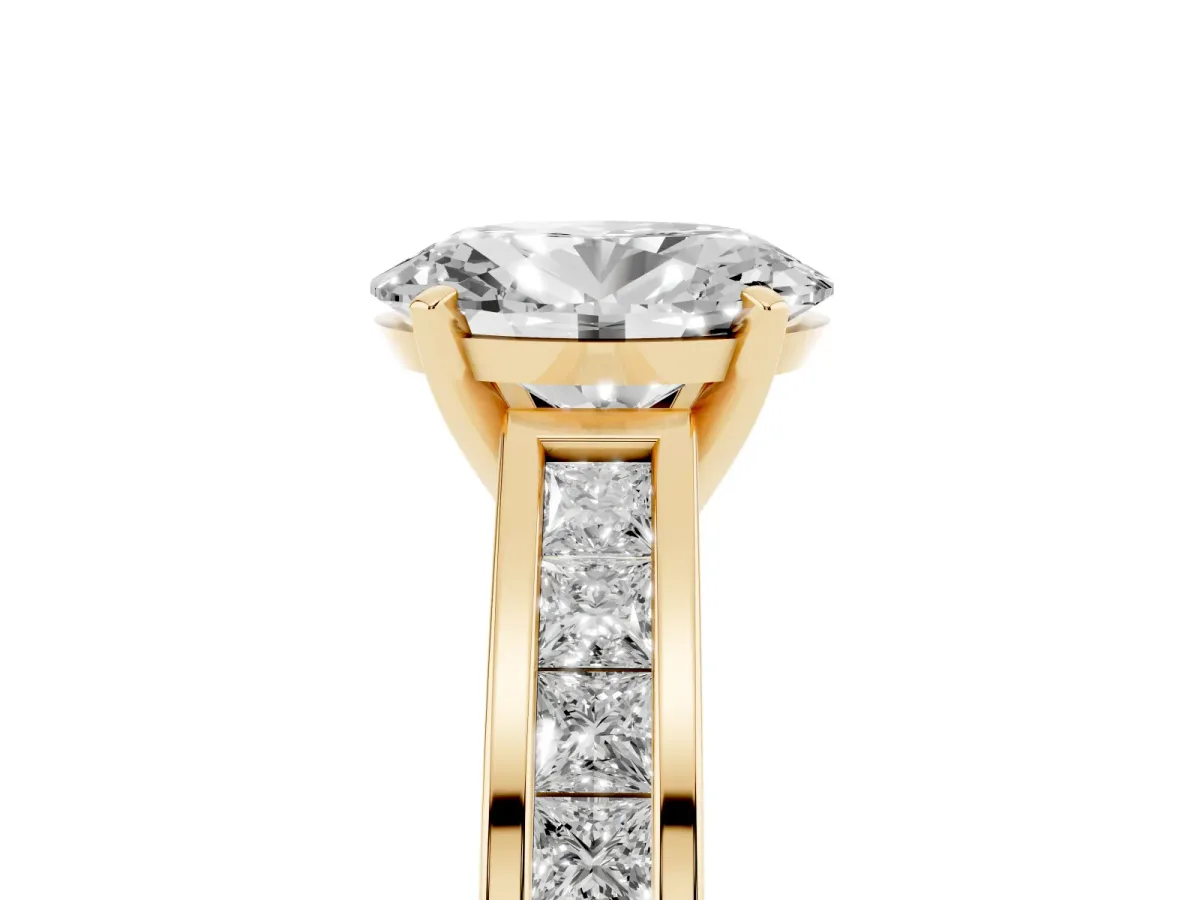 Oval Cut Solitaire Diamond Ring with Channel-Set Band and Four-Prong Setting Yellow gold