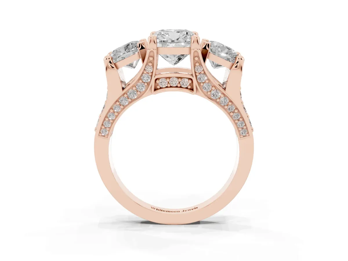 Cushion Cut Diamond Three-Stone Ring with Channel Set Band and Four-Prong Setting Rose gold