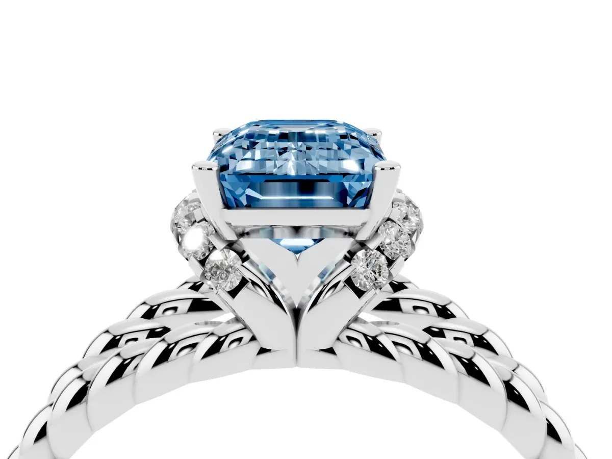 Fancy Blue Emerald Cut Halo Twisted Band Four-Prong Ring Silver