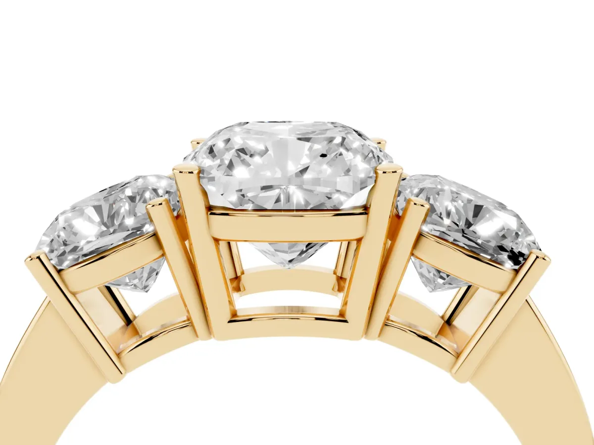 Three-Stone Cushion Cut Cut Diamond Engagement Ring with Flat Band and Four-Prong Setting Yellow gold