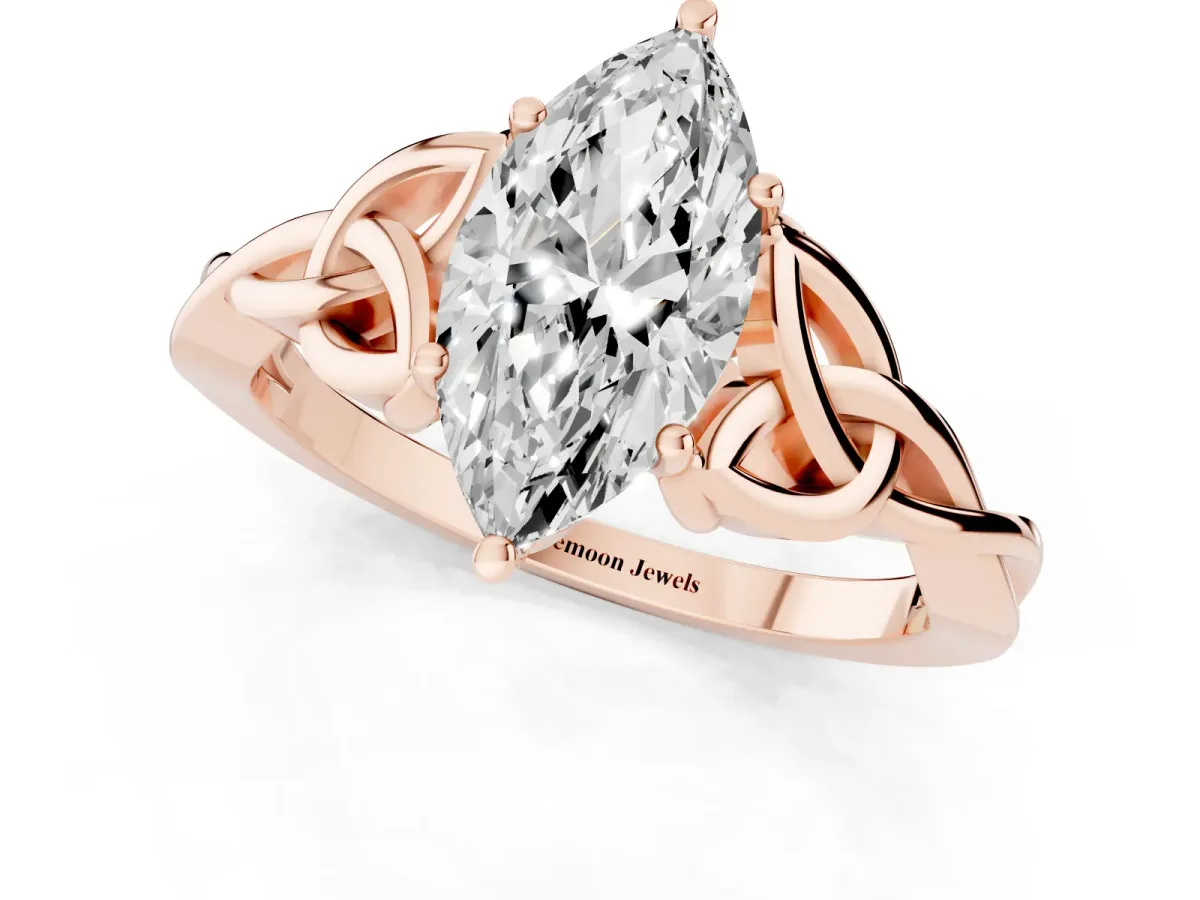 Marquise Cut Diamond Solitaire Engagement Ring with Celtic Knot Band and Four-Prong Setting Rose gold