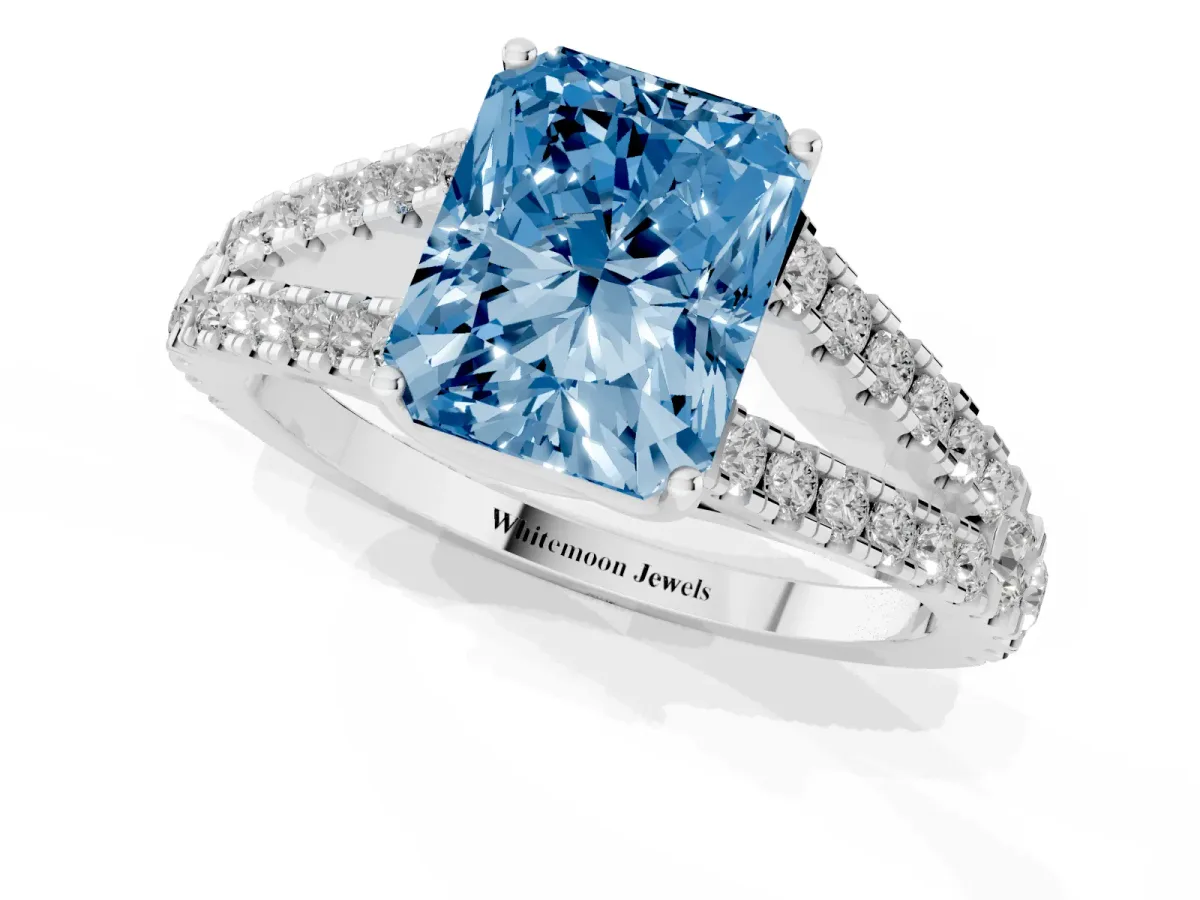 Fancy Blue Radiant Cut Diamond Split Shank Pavé Engagement Ring with Four-Prong Setting White gold