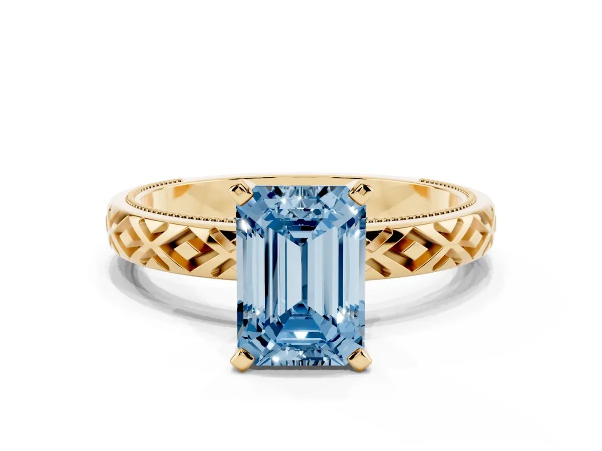 Fancy Blue Emerald Cut Solitaire Diamond Ring with Milgrain and Black Enamel X Pattern Band Yellow gold