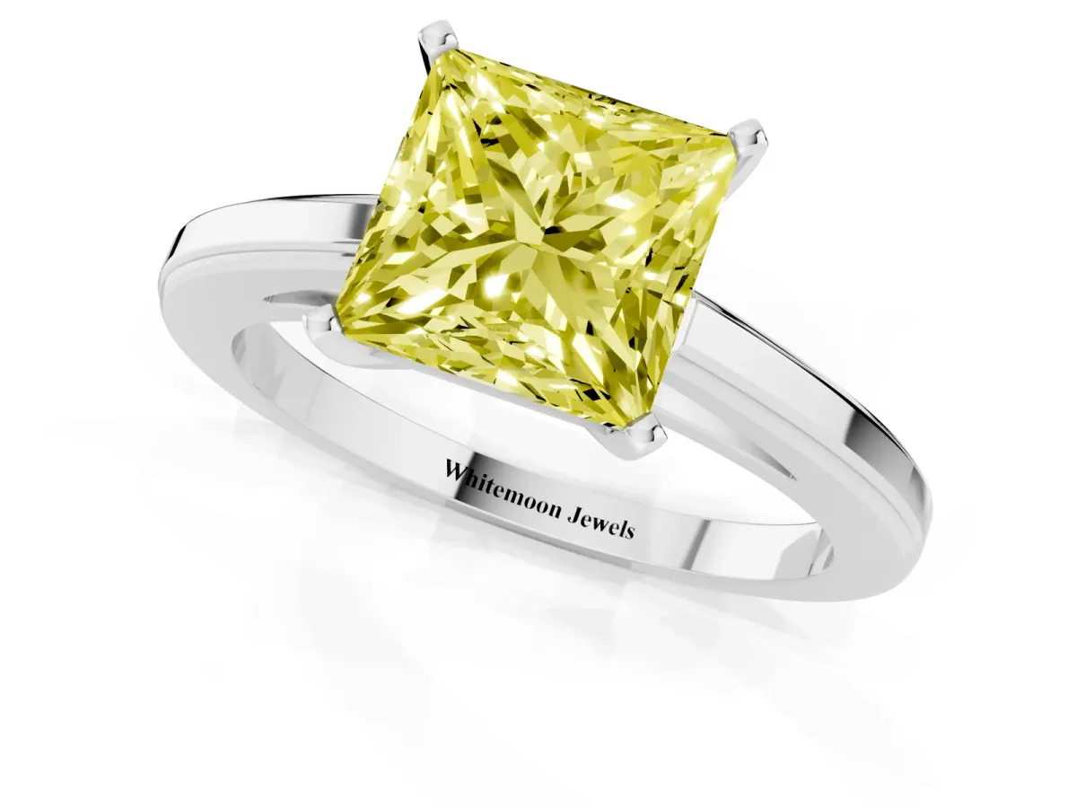 Fancy Yellow Princess Cut Solitaire Diamond Ring with Four-Prong Setting and Classic Band Silver