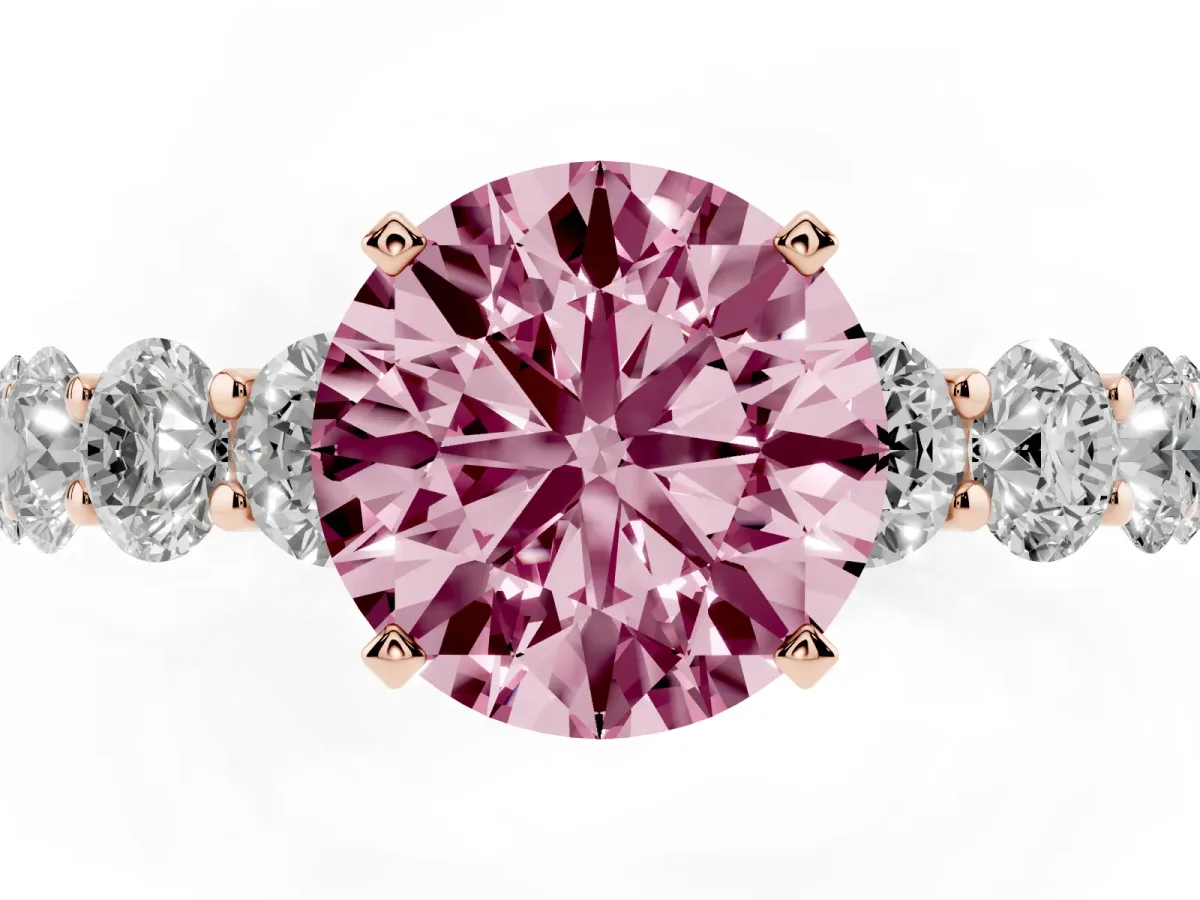Fancy Pink Round Cut Diamond Prong Setting with Side Stones on a Pave Band Rose gold