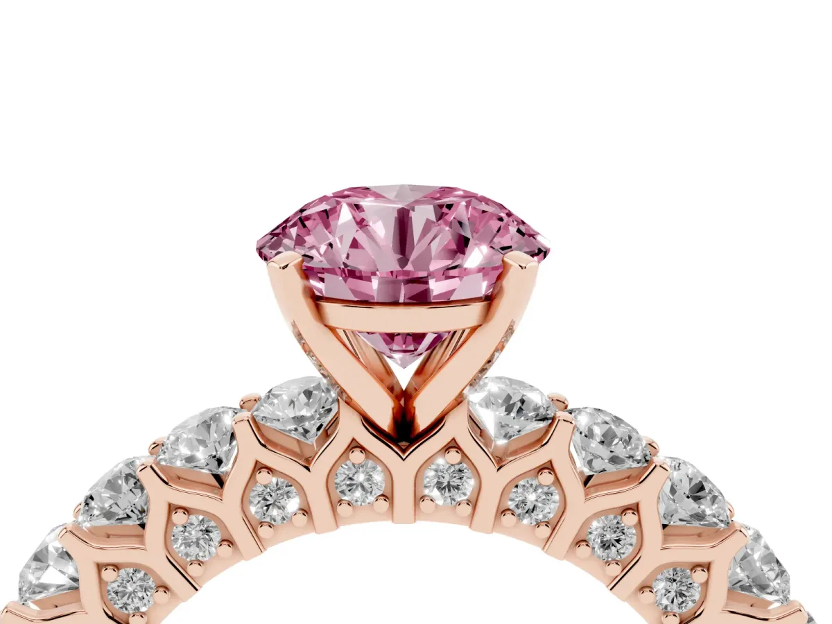 Fancy Pink Round Cut Diamond Solitaire Ring with Shared Prong Pavé Band and Four-Prong Setting Rose gold