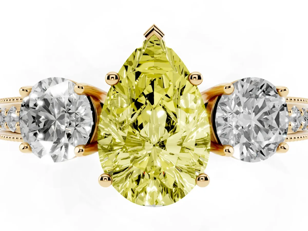 Fancy Yellow Pear Cut Three-Stone Diamond Ring with Pavé Band and Four-Prong Setting Yellow gold