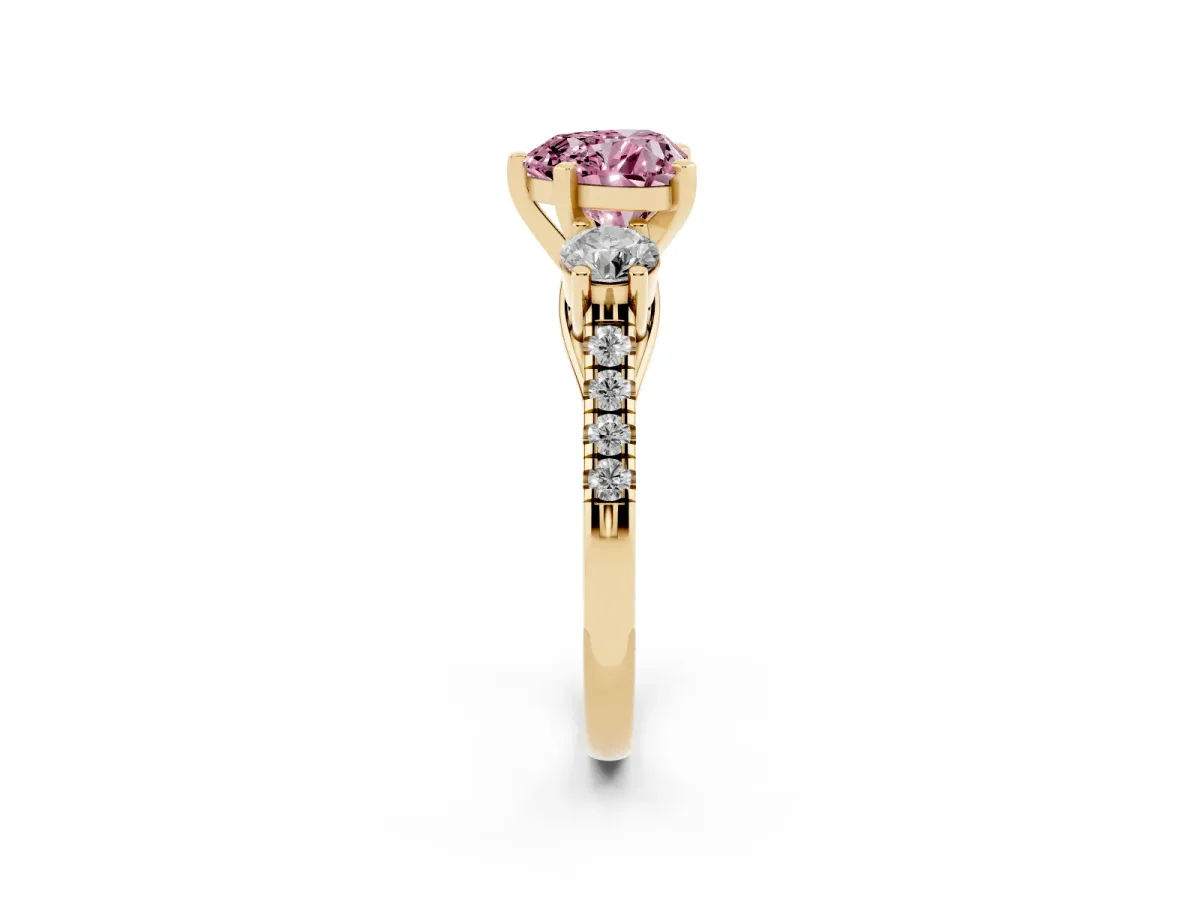Fancy Pink Three-Stone Heart Cut Diamond Pavé Band with Four-Prong Setting Yellow gold