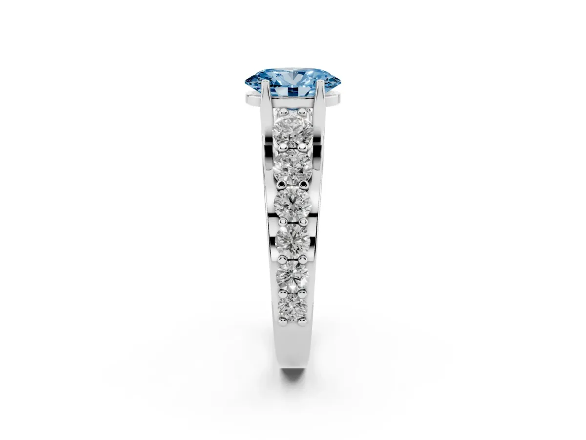 Fancy Blue Oval Cut Diamond Engagement Ring with Pavé Band and Four-Prong Setting Silver