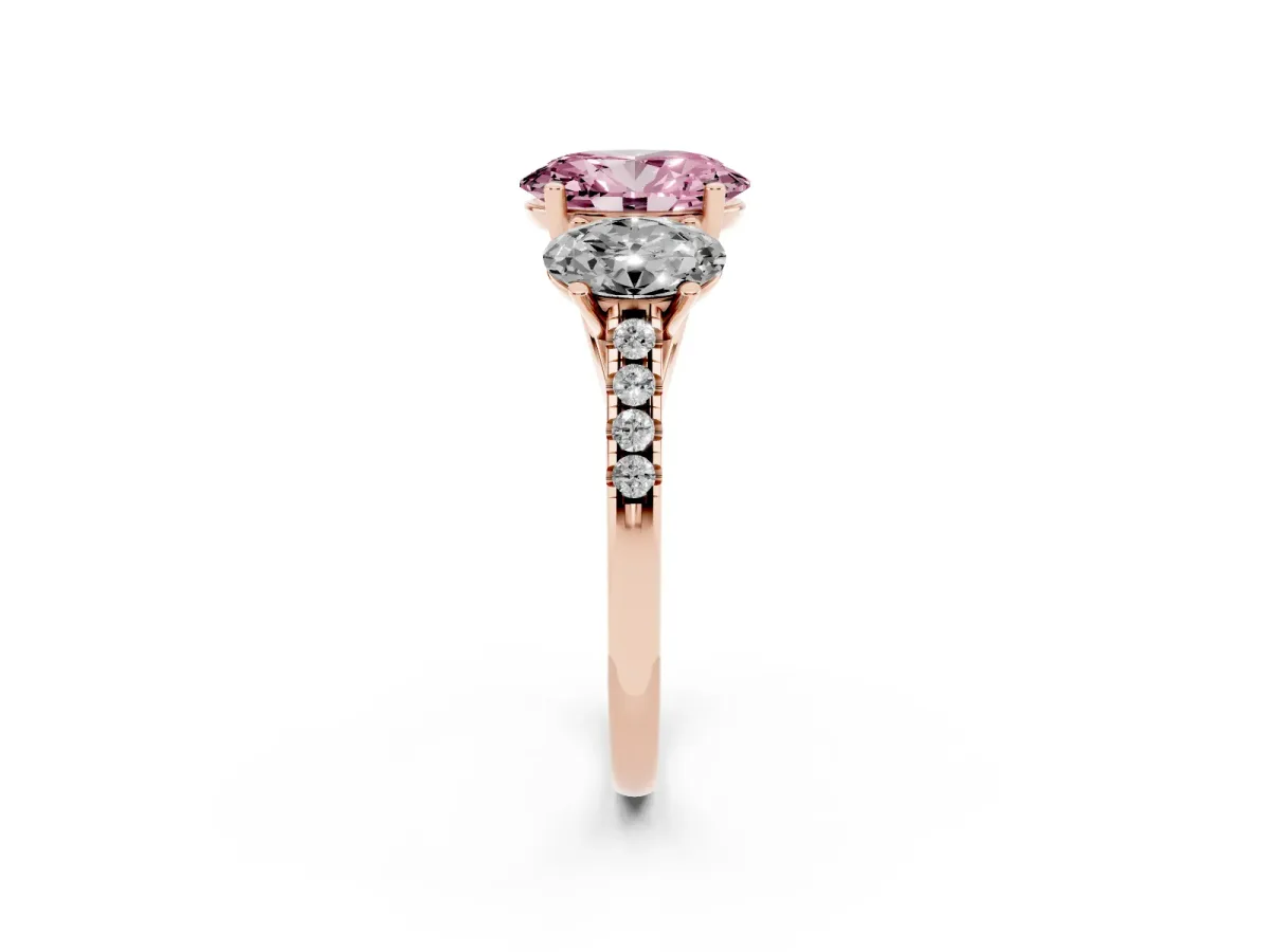 Fancy Pink Three-Stone Oval Cut Diamond Ring with Round Pavé Band and Prong Setting Rose gold