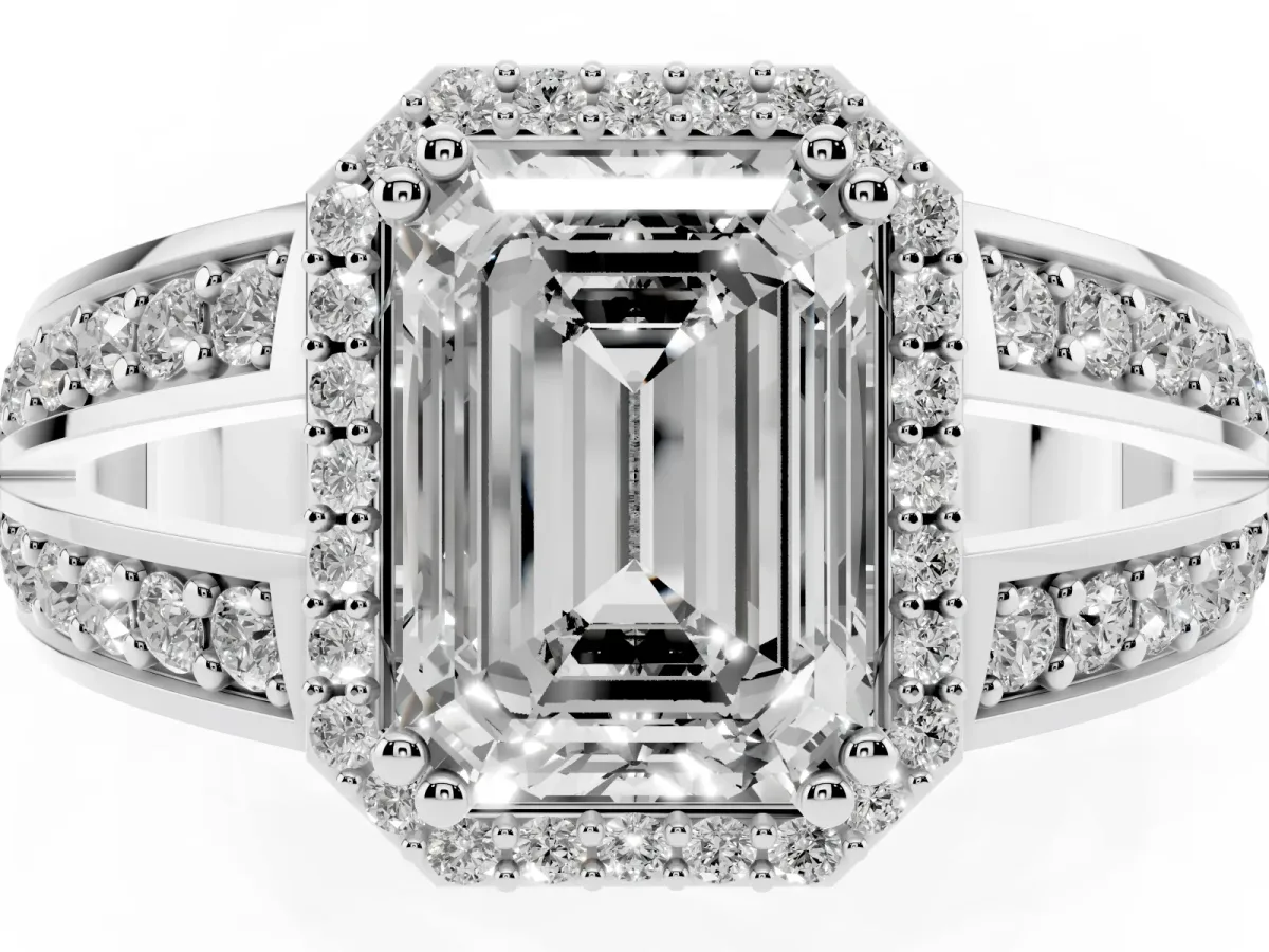 Emerald Cut Diamond Halo Ring with Split Shank Pavé Band and Four-Prong Setting Platinum