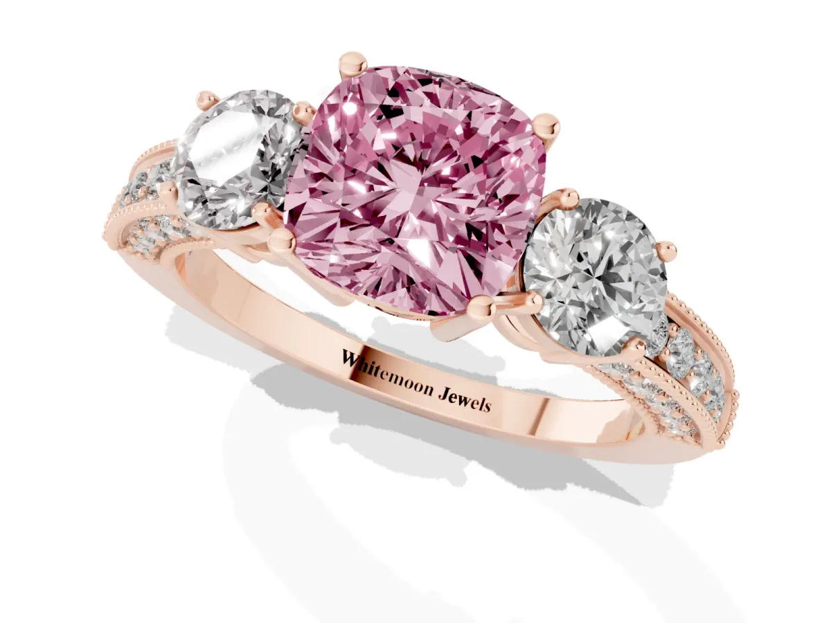 Fancy Pink Cushion Cut Three-Stone Diamond Ring with Pavé Band and Four-Prong Setting Rose gold
