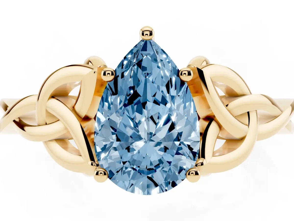 Fancy Blue Pear Cut Diamond Solitaire Engagement Ring with Celtic Knot Band and Four-Prong Setting Yellow gold