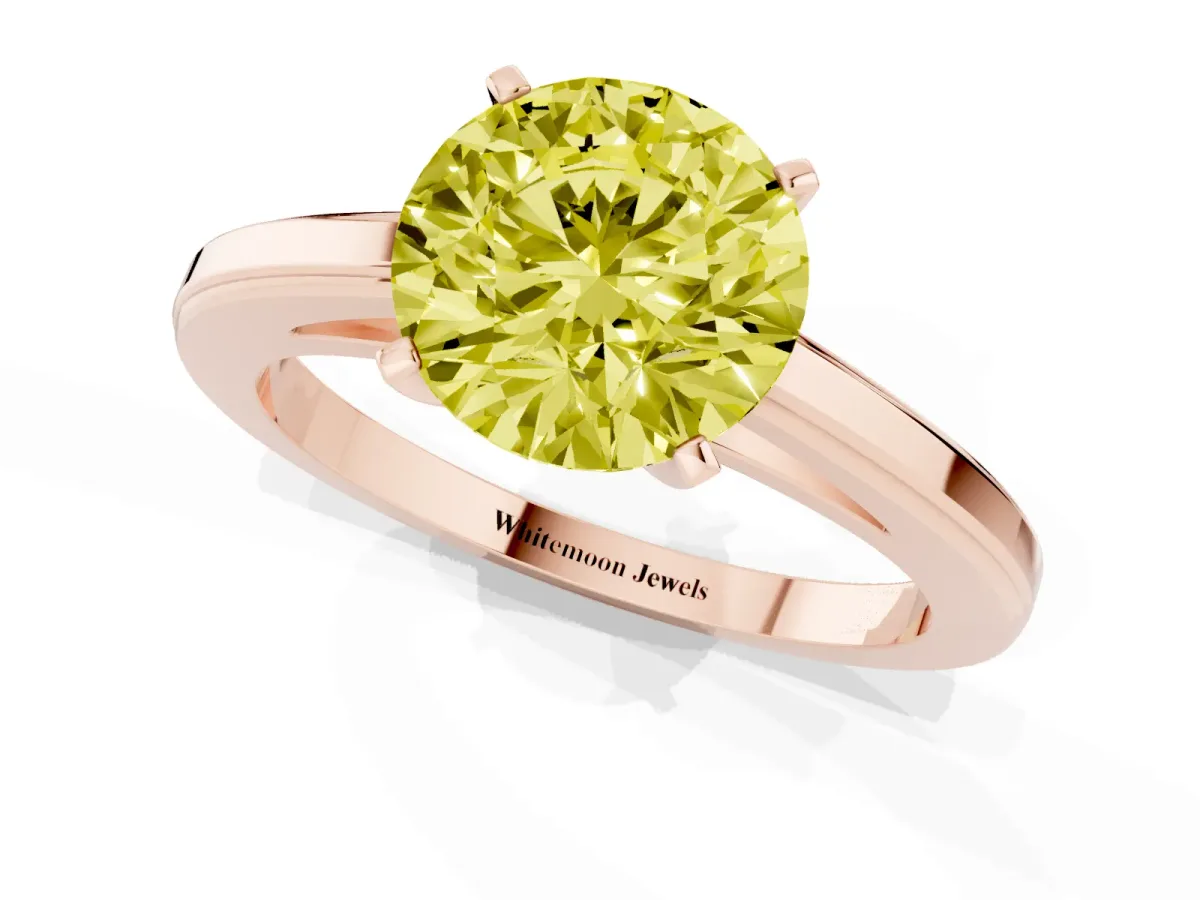 Fancy Yellow Round Cut Solitaire Diamond Ring with Four-Prong Setting and Classic Band Rose gold