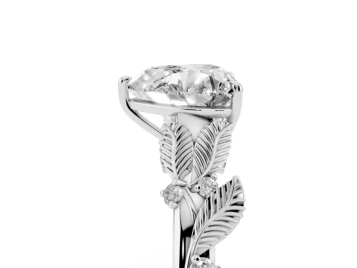 Heart Cut Diamond Solitaire Ring with Leaf Motif Band and Four-Prong Setting Silver