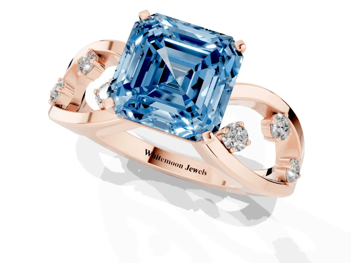 Fancy Blue Asscher Cut Cut Solitaire Diamond with Side Stones on Criss-Cross Band and Four-Prong Setting Rose gold
