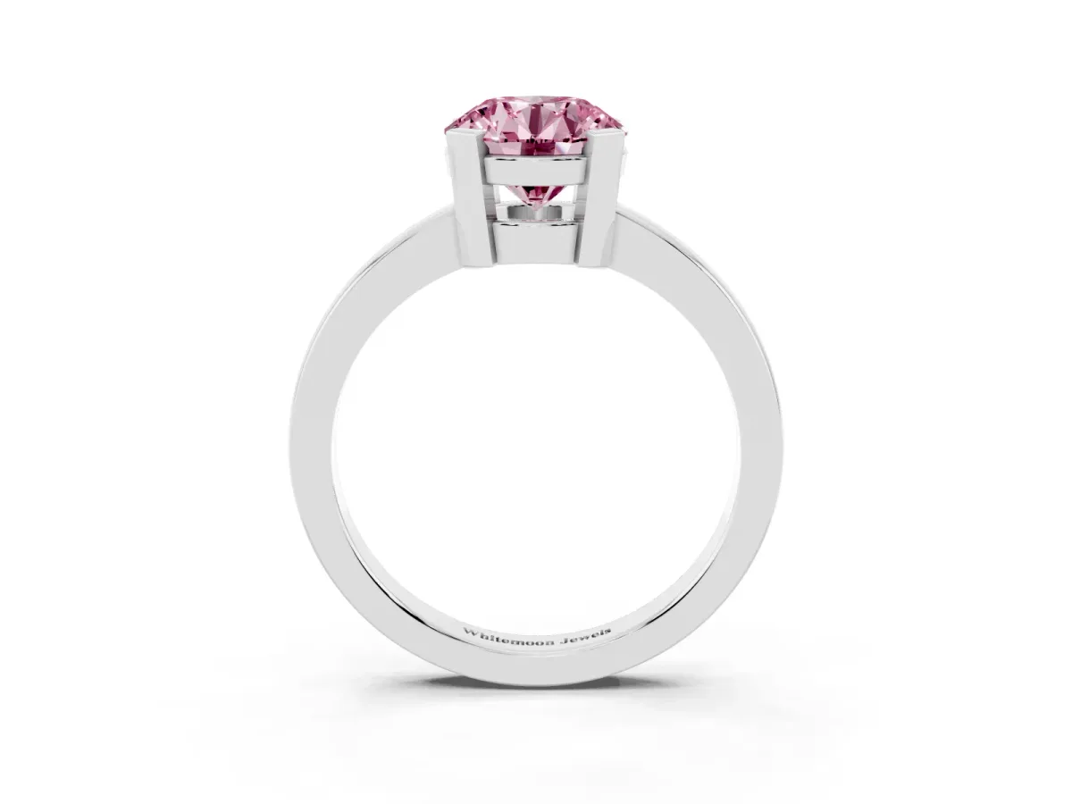 Fancy Pink Round Cut Cut Solitaire Ring with Four-Prong Setting and Classic Band Silver