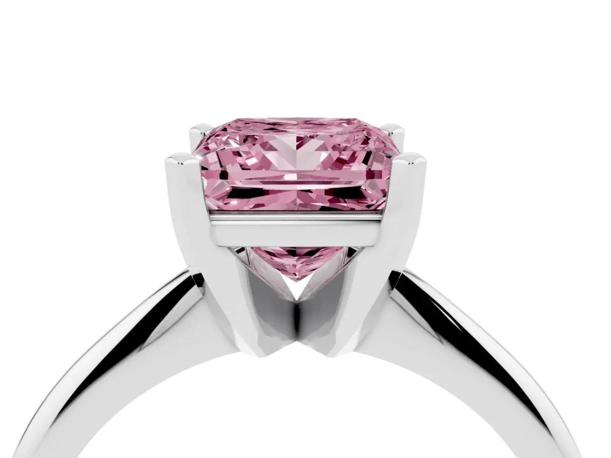 Fancy Pink Princess Cut Cut Solitaire Ring with Four-Prong Setting on a Classic Band Silver