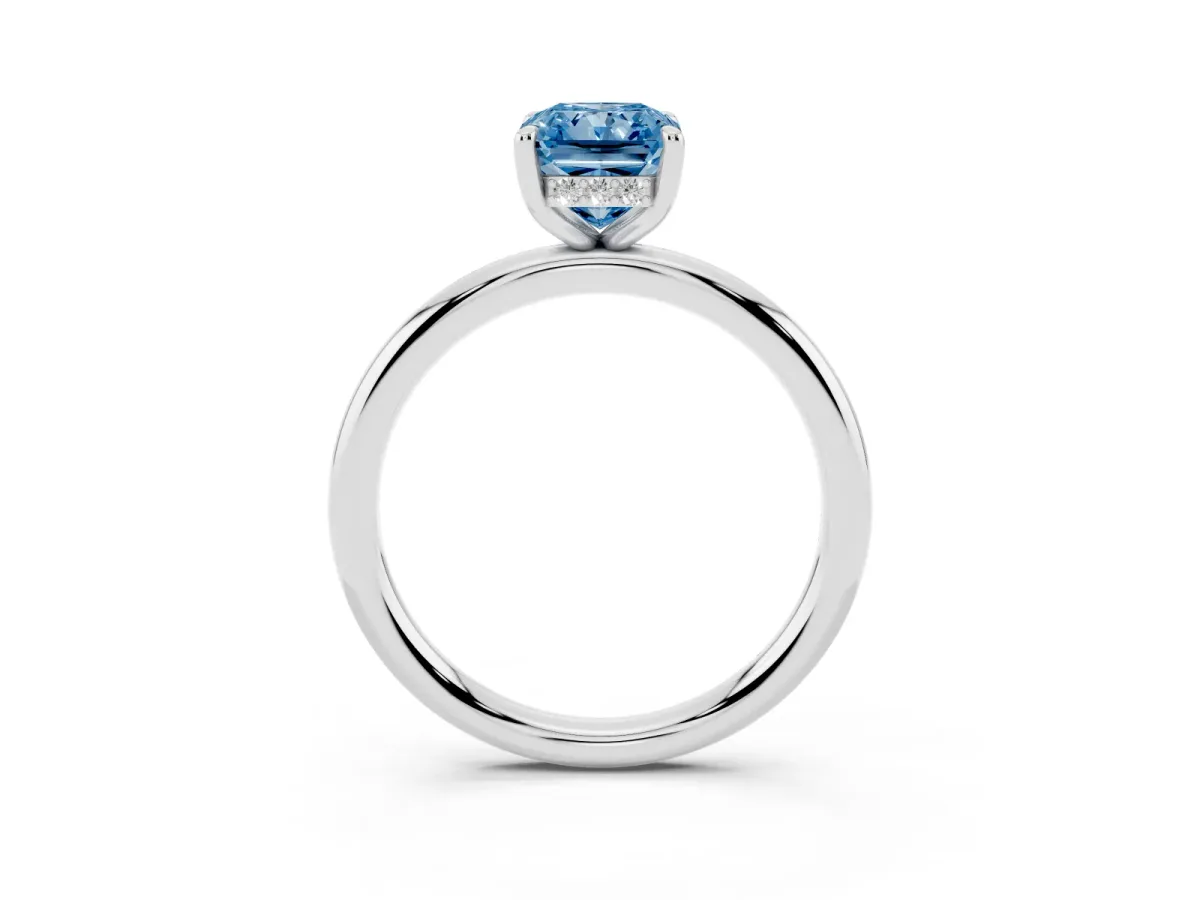 Fancy Blue Radiant Cut Diamond Solitaire Ring with Thin Band and Four-Prong Setting Silver