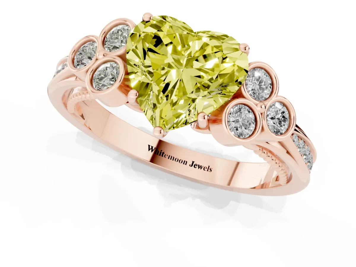 Fancy Yellow Heart Cut Cut Diamond Engagement Ring with Bezel Set Round Side Stones and Prong Setting Rose gold