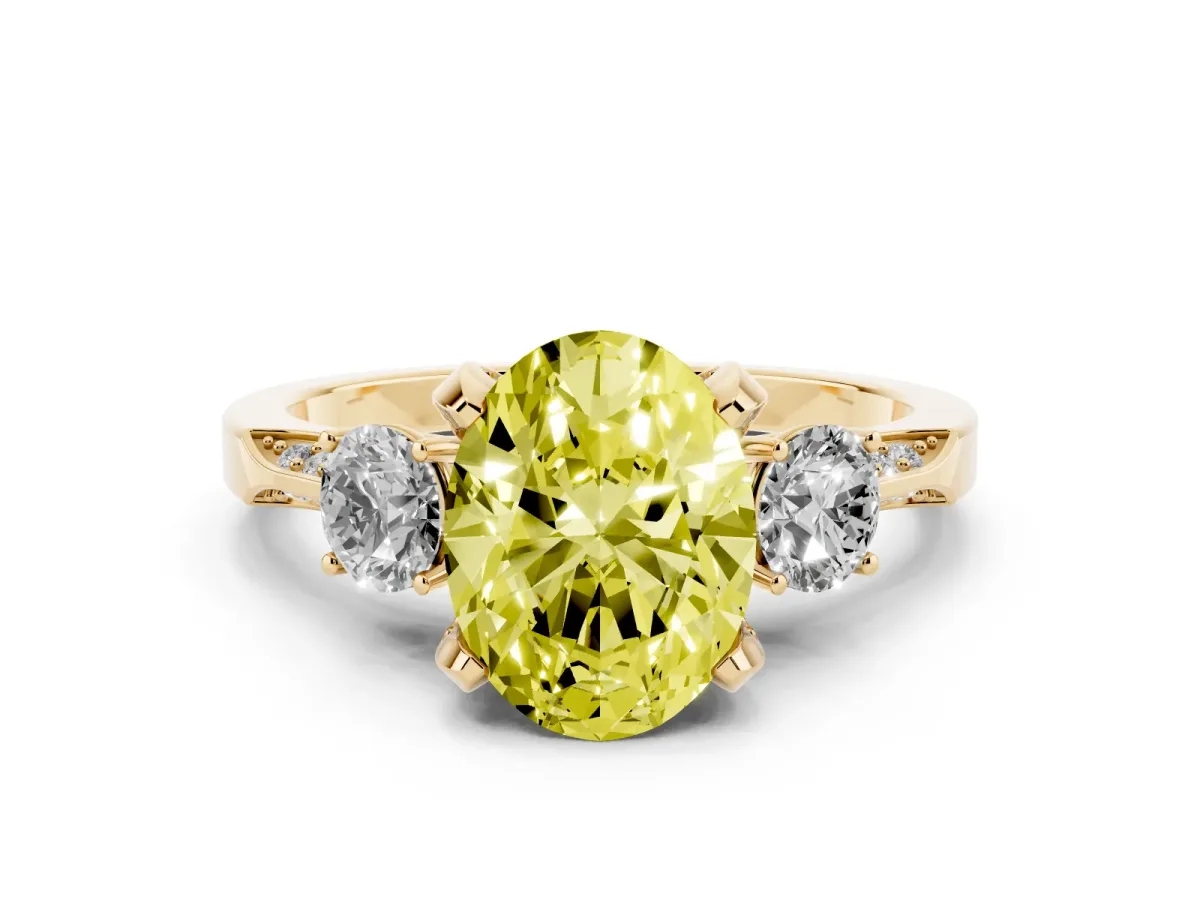 Fancy Yellow Oval Cut Brilliant Three-Stone Diamond Ring with Pavé Band and Four-Prong Setting Yellow gold