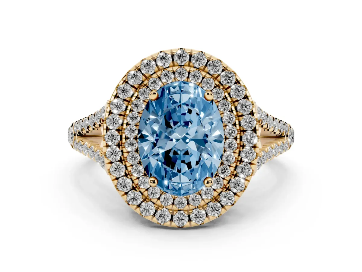 Fancy Blue Oval Cut Diamond Double Halo Ring with Pavé Band and Prong Setting Yellow gold
