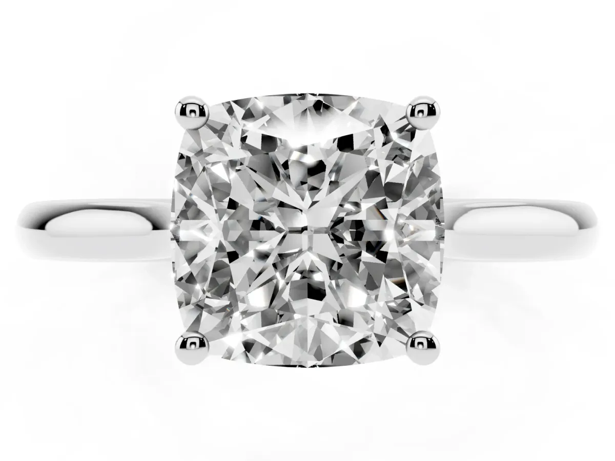 Cushion Cut Cut Solitaire Ring with Cathedral Band and Four-Prong Setting Silver
