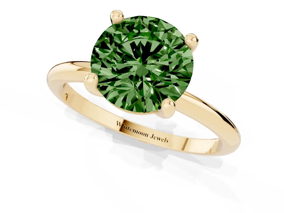 Fancy Green Round Cut Solitaire Diamond Ring with 4-Prong Setting on a Classic Band Yellow gold