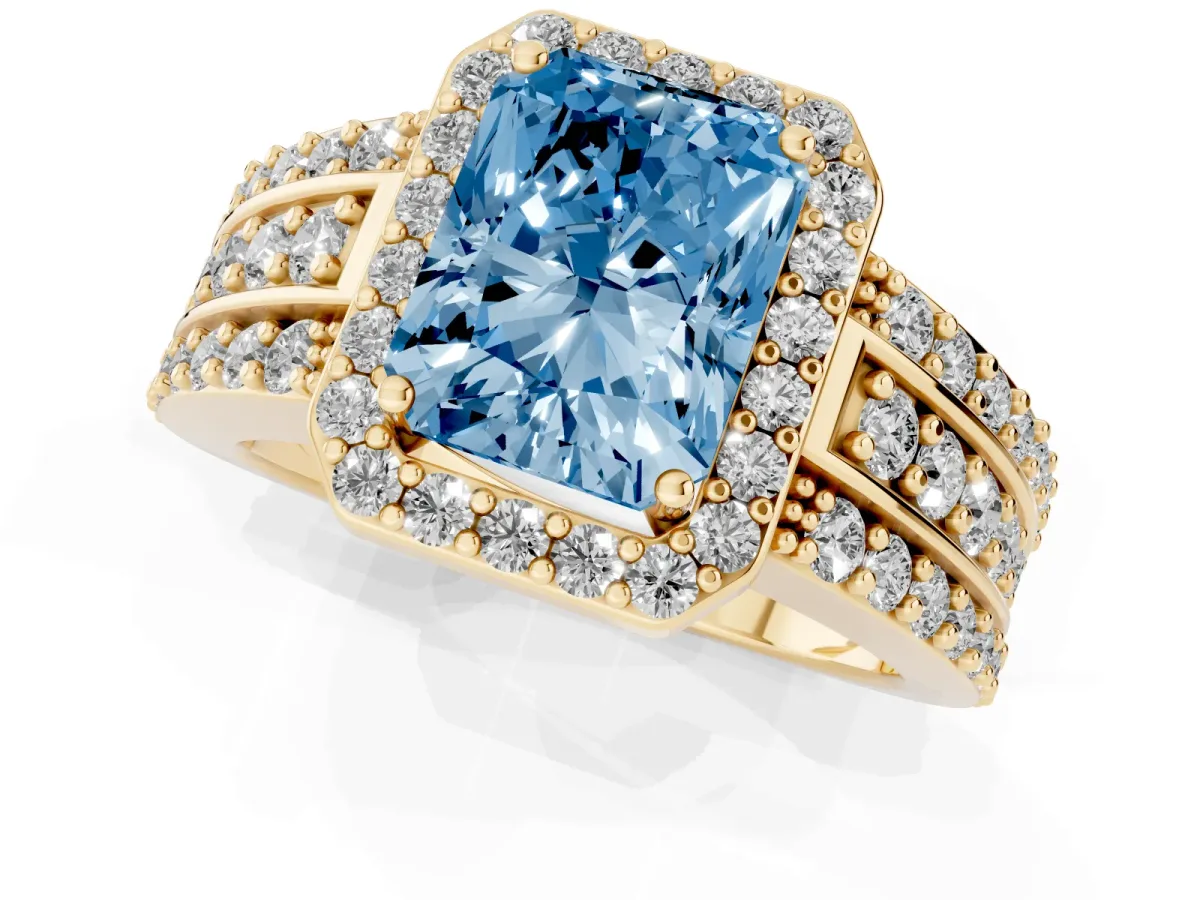 Fancy Blue Radiant Cut Halo Diamond Ring with Round Split Shank and Prong Setting Yellow gold