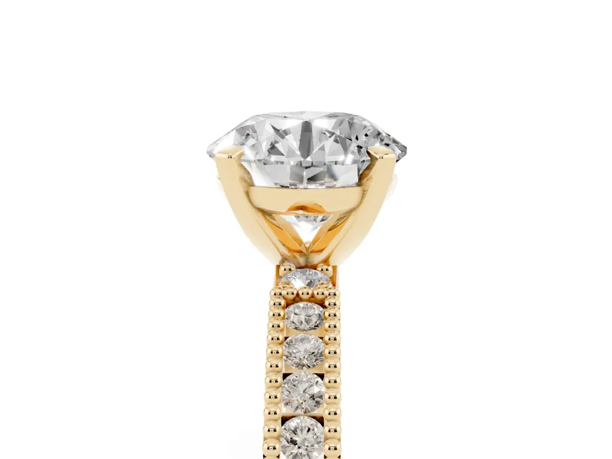 Round Cut Solitaire with Pavé Band and Four-Prong Setting Yellow gold