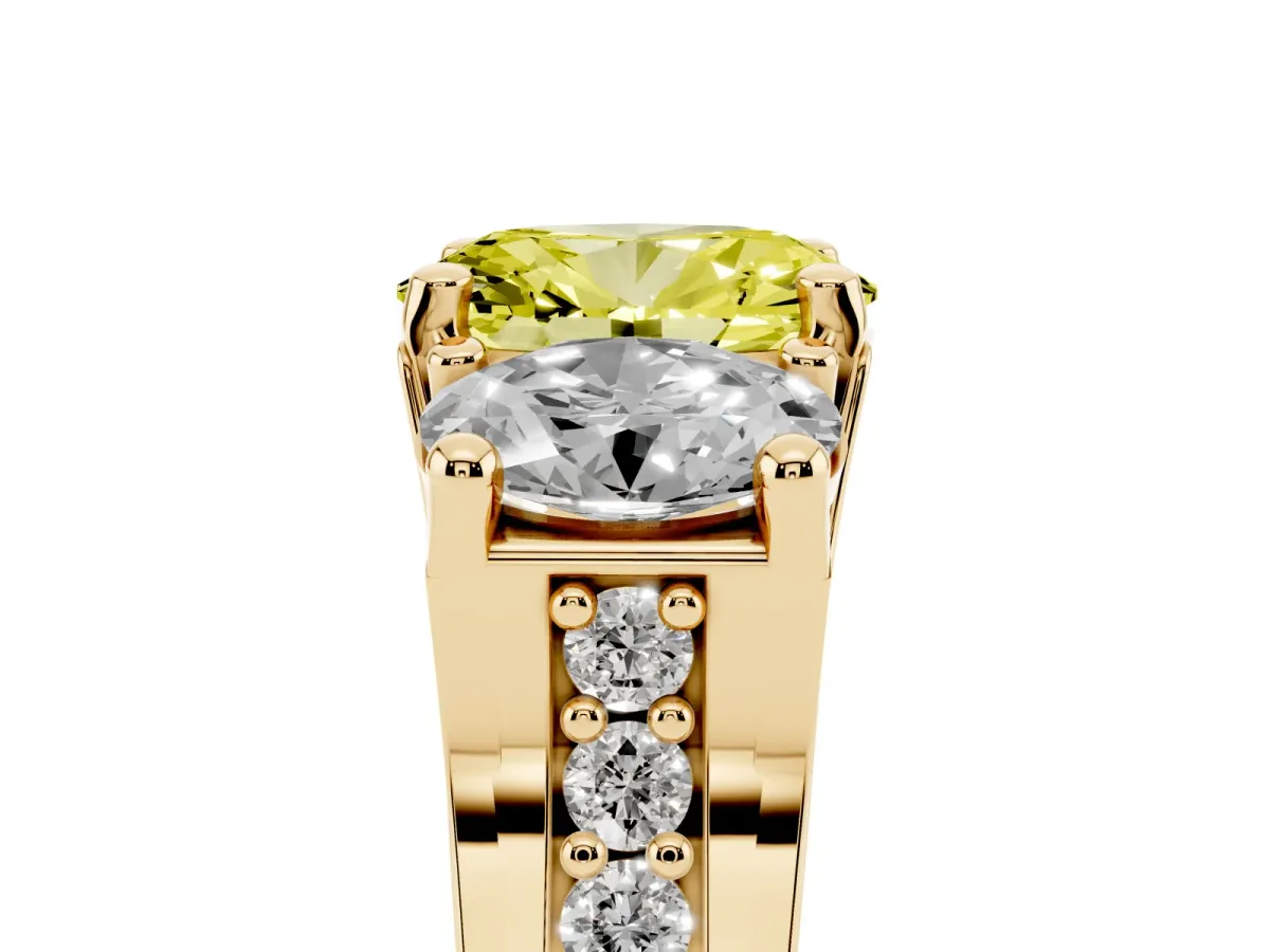 Fancy Yellow Oval Cut Diamond Three-Stone Ring with Channel Set Band and Four-Prong Setting Yellow gold