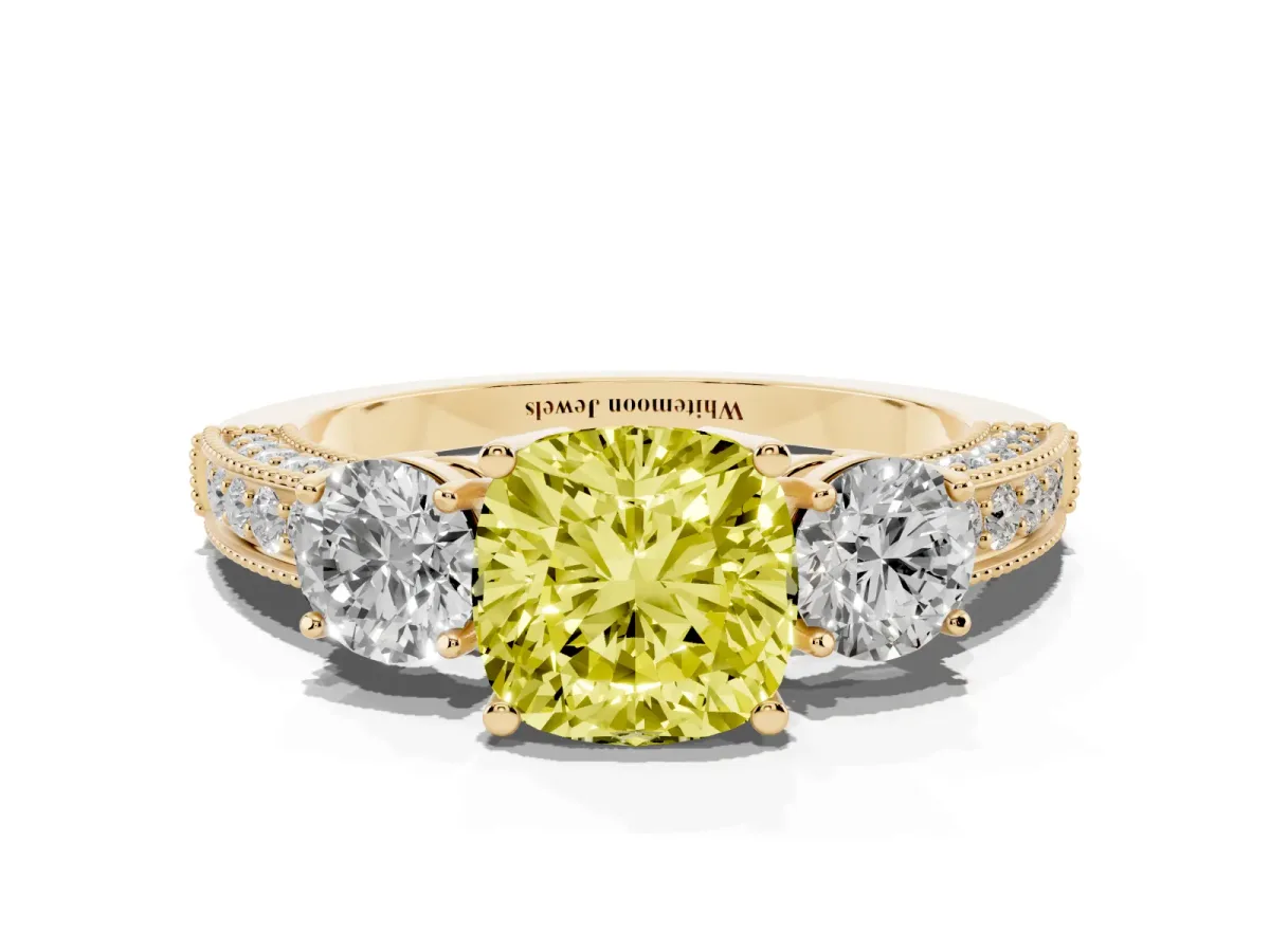 Fancy Yellow Cushion Cut Three-Stone Diamond Ring with Pavé Band and Four-Prong Setting Yellow gold