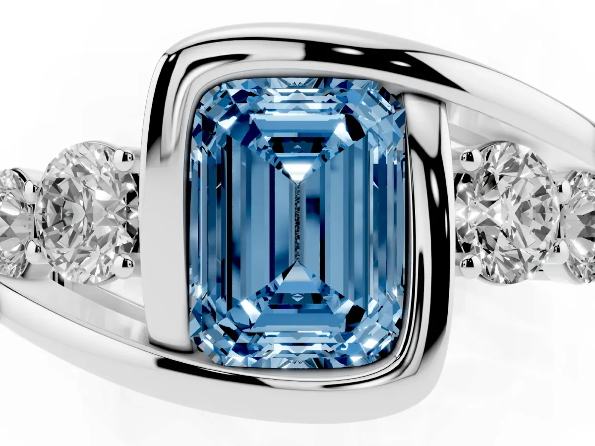 Fancy Blue Bezel Set Emerald Cut Diamond Bypass Ring with Round Accents Silver